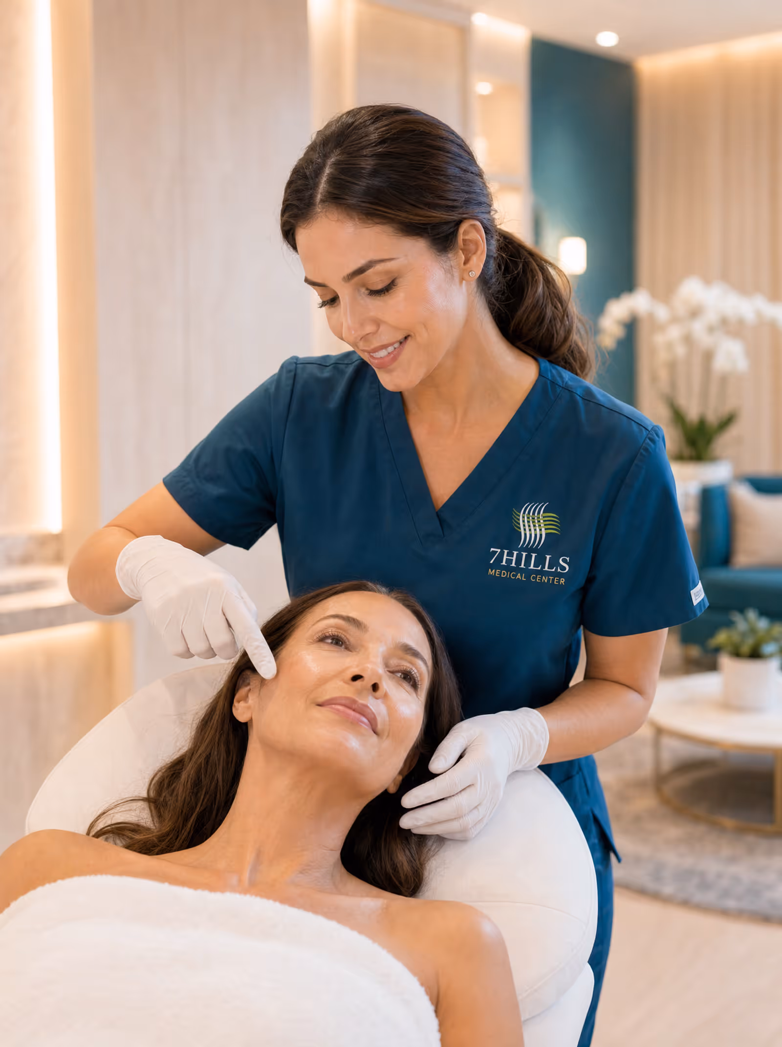 Elegant woman receiving a facial skin assessment