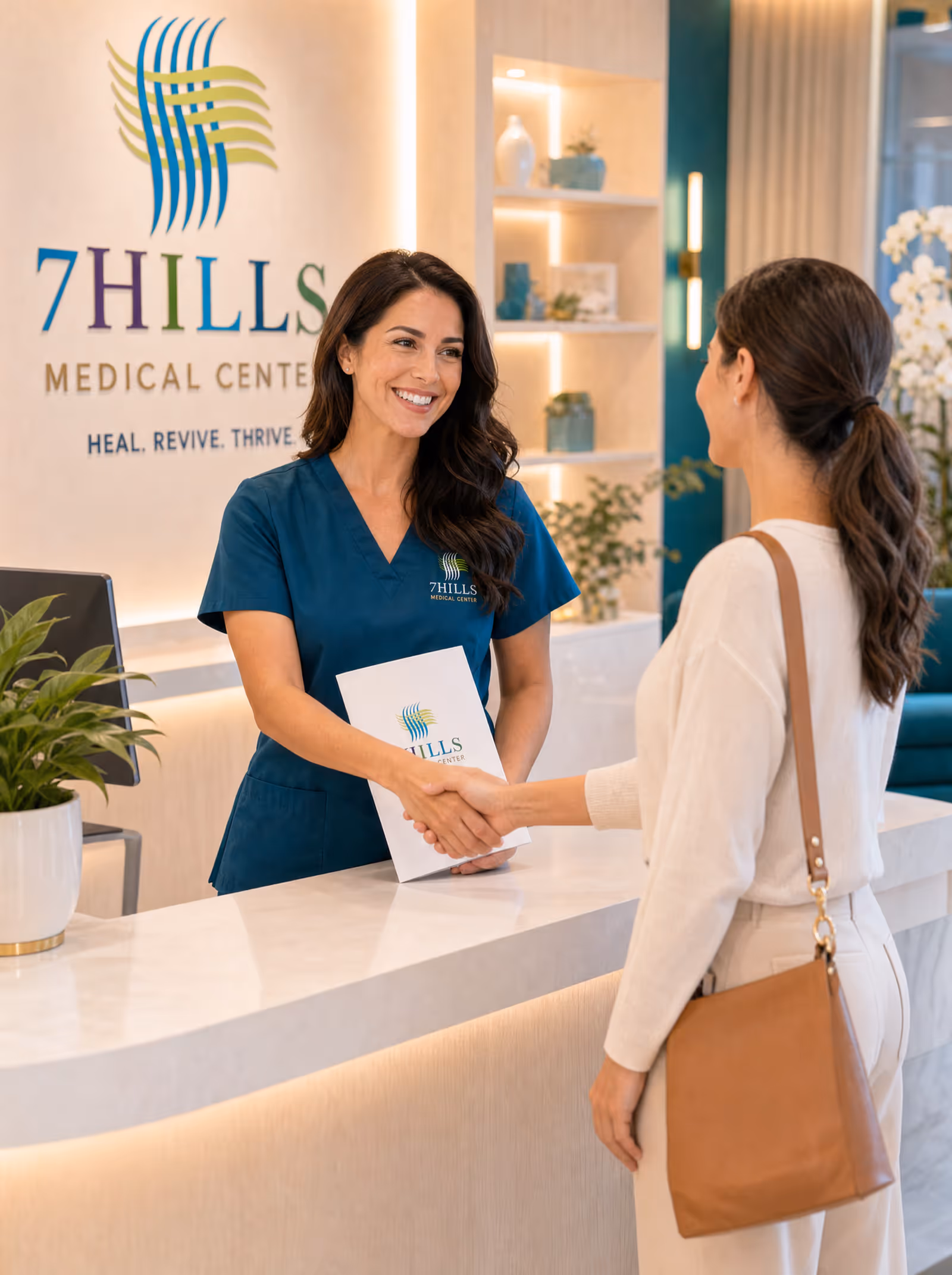 Patient receiving a welcome folder and handshake at the front desk